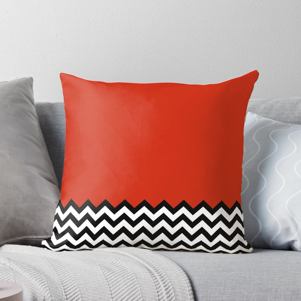 A black, white, and red graphic pillow inspired by the iconic Black Lodge from the TV series Twin Peaks.
