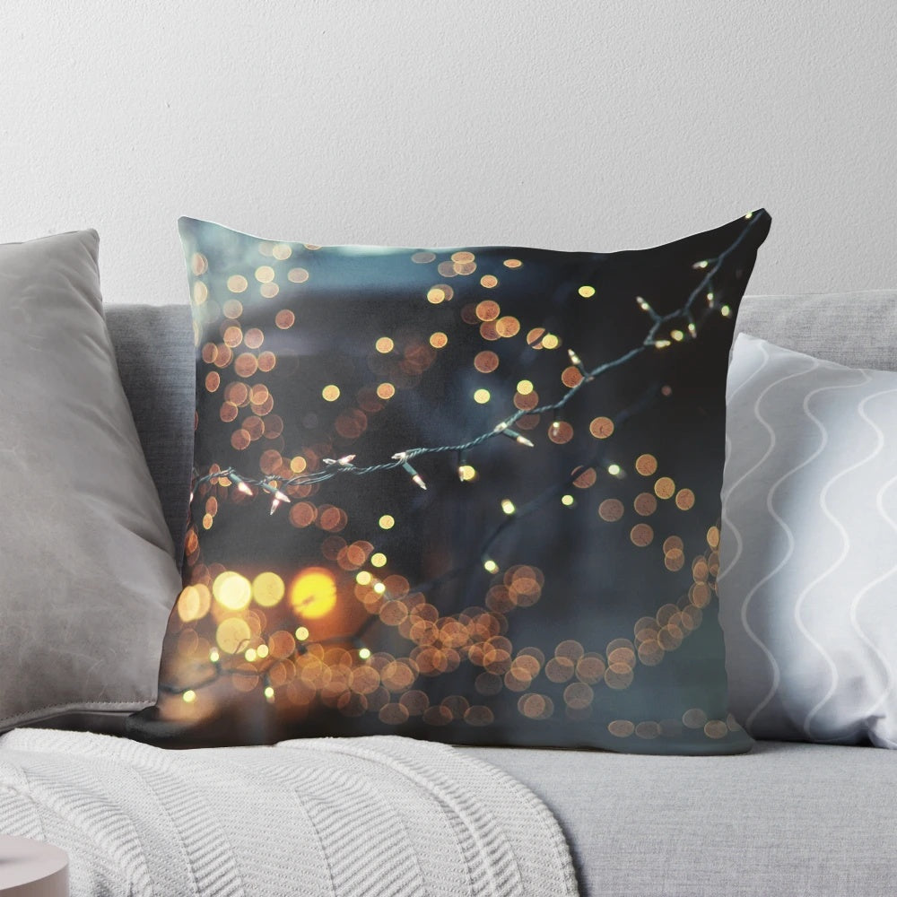 Cozy pillow with twinkling lights and bokeh effect, perfect for adding a romantic touch to any room.