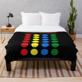 Funny twisted twister-themed plush blanket with polka dot pattern