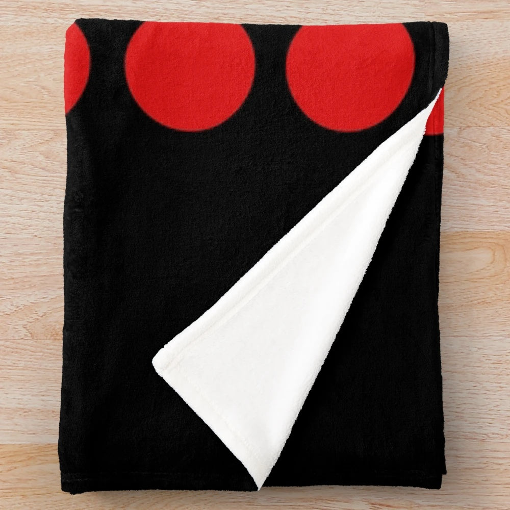 Funny twisted twister-themed plush blanket with polka dot pattern