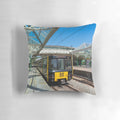 Tynemouth Metro Train Station Pillow featuring the iconic glass roof and yellow train