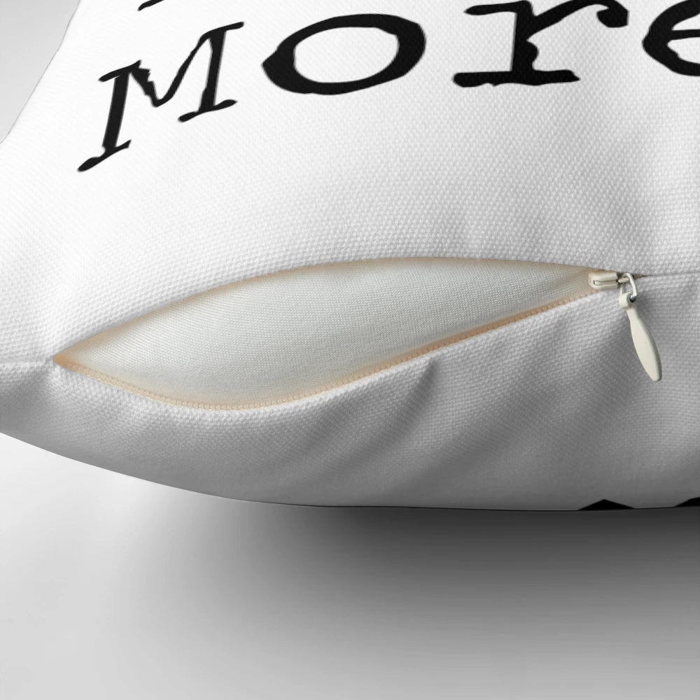 Black and white typographic "I Love You More" pillow