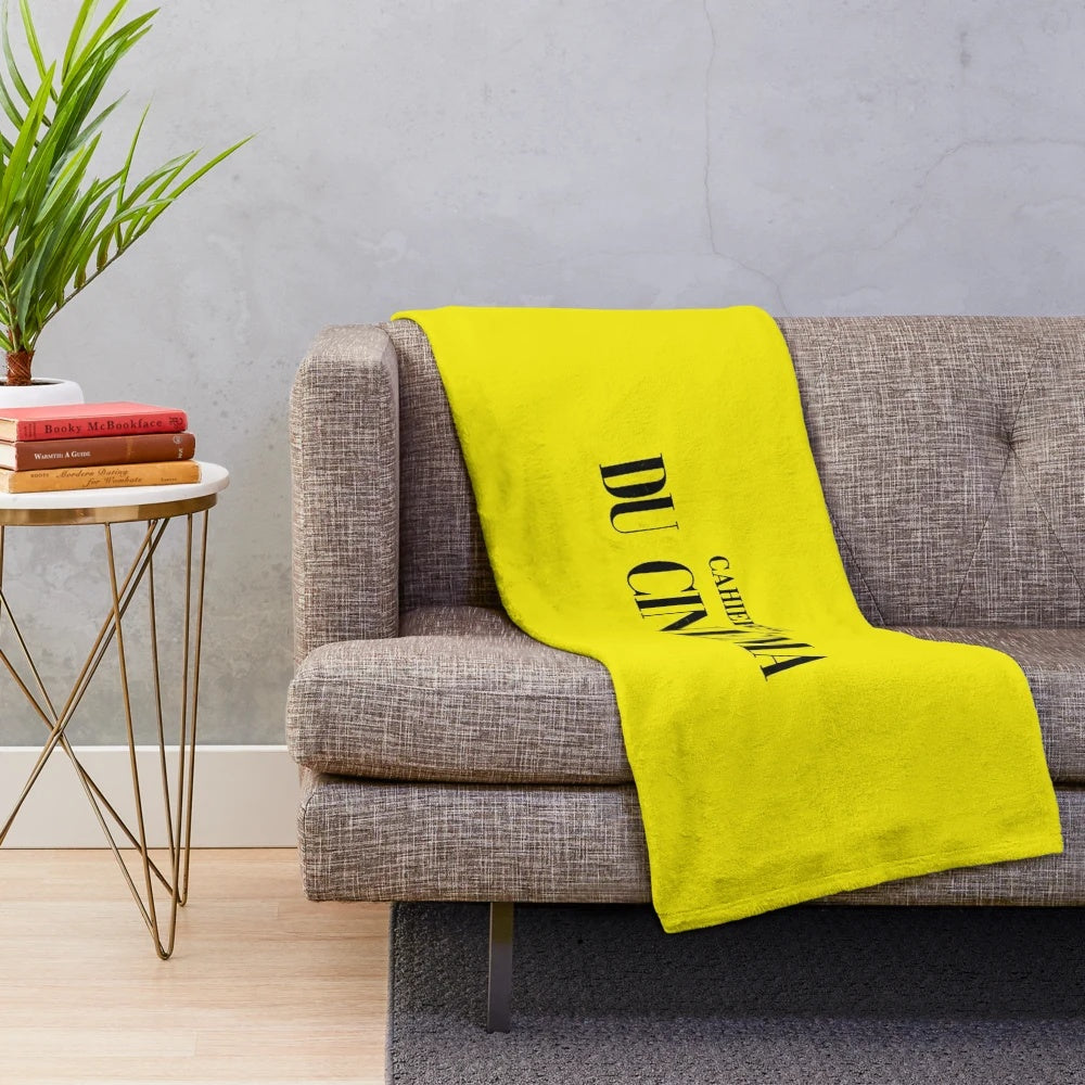 Plush blanket featuring typography and logo design inspired by French New Wave cinema