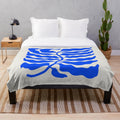 Ultramarine blue plush blanket with mid-century modern art-inspired design
