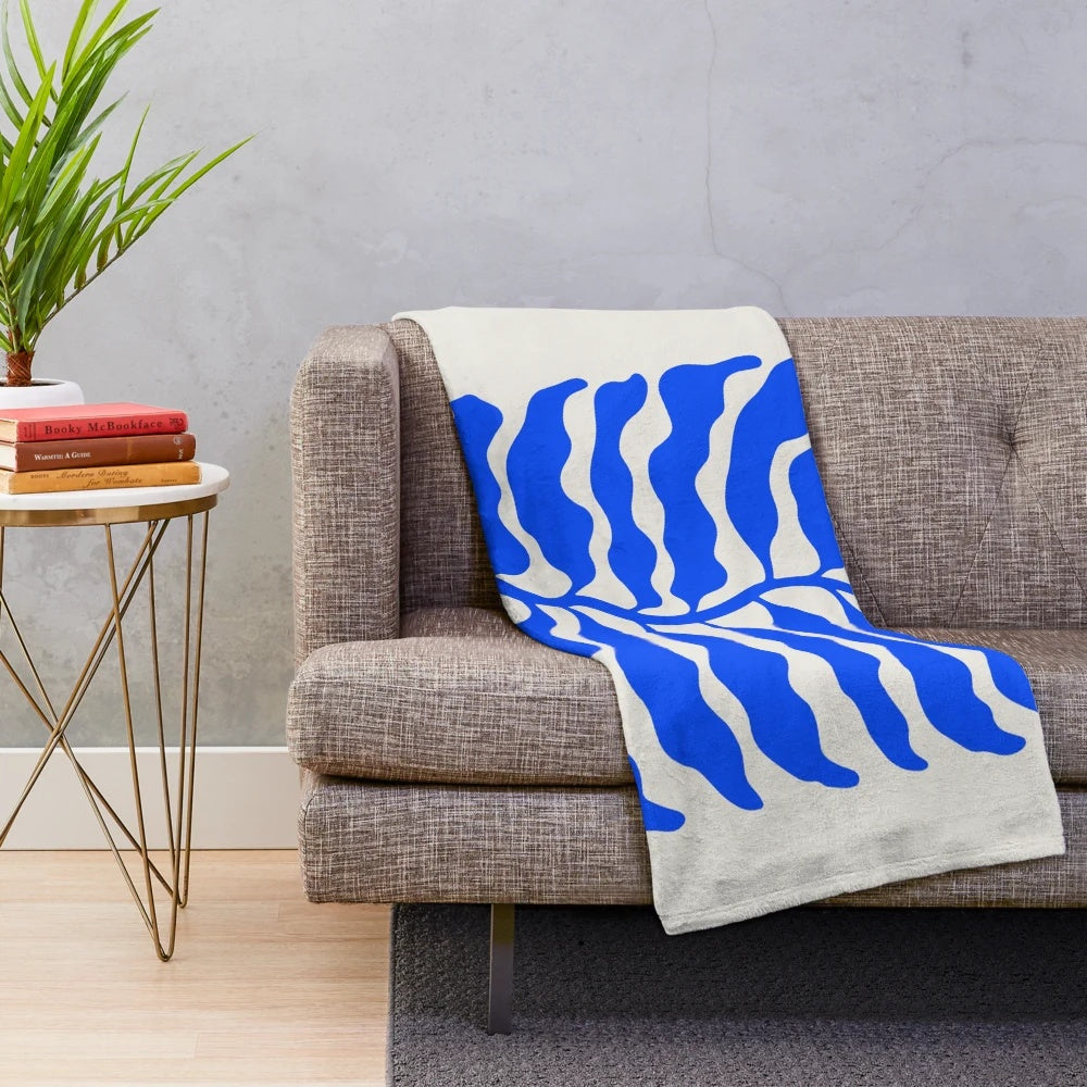 Ultramarine blue plush blanket with mid-century modern art-inspired design