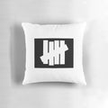 Undefeated Pillow featuring Jordan collaboration design and UNDFTD branding
