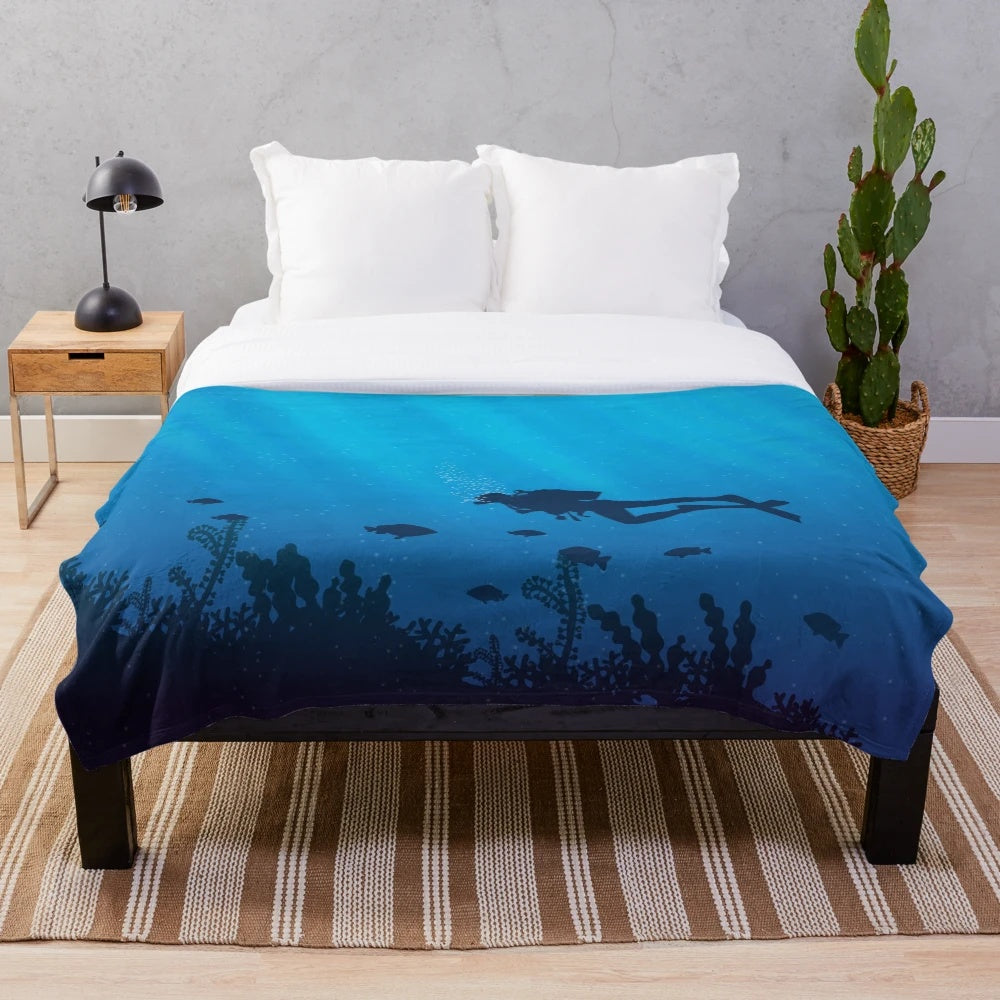 Cozy plush blanket with scuba diving pattern