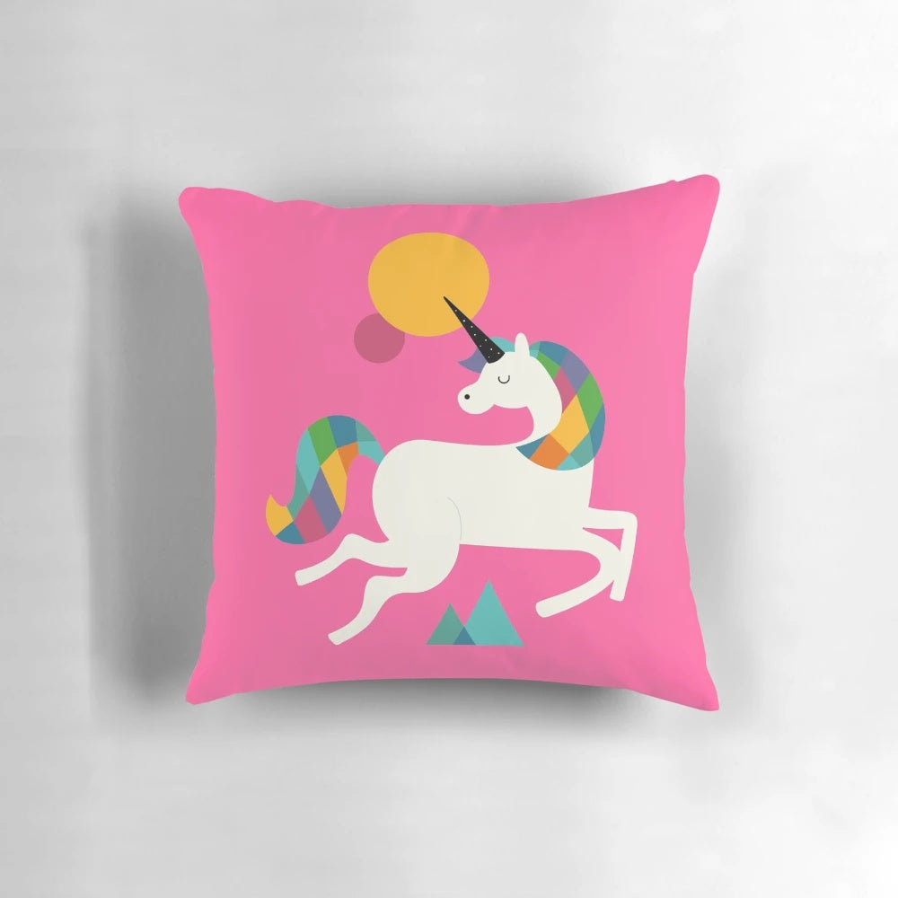 Vibrant rainbow unicorn design on a plush, soft pillow