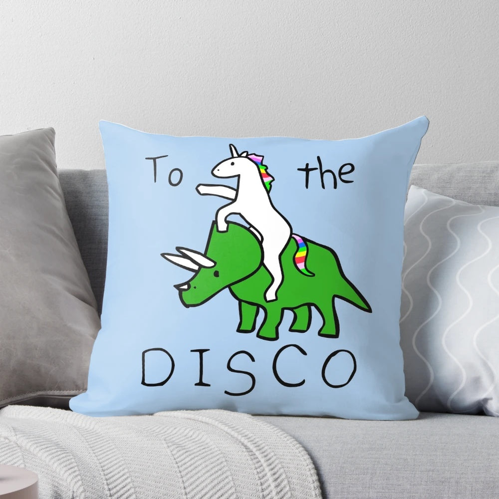 Colorful disco-themed pillow featuring a unicorn riding a triceratops dinosaur