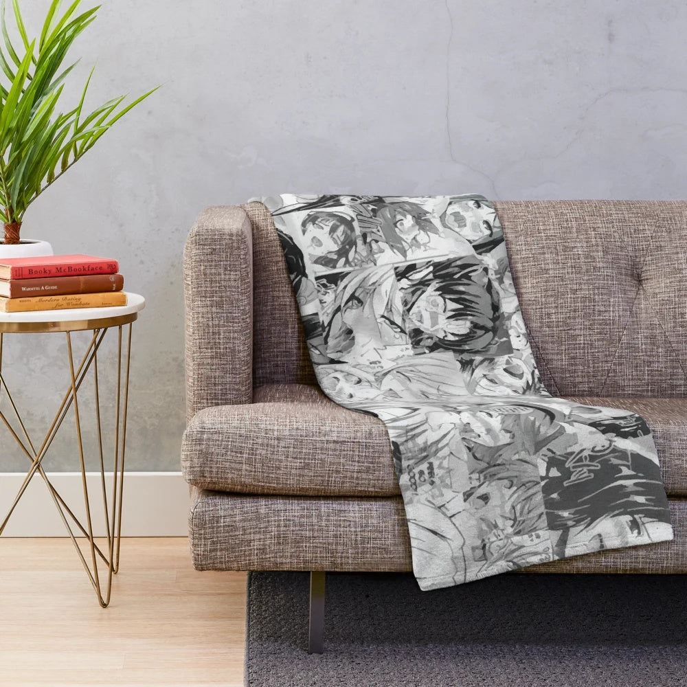 Plush blanket featuring a panel of weird, anime-style faces