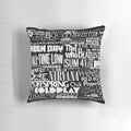 Colorful collage of popular music band logos and artwork printed on a comfortable throw pillow