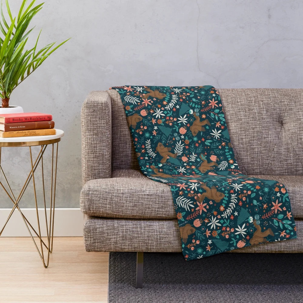 Bigfoot floral plush blanket with a unique, quirky design