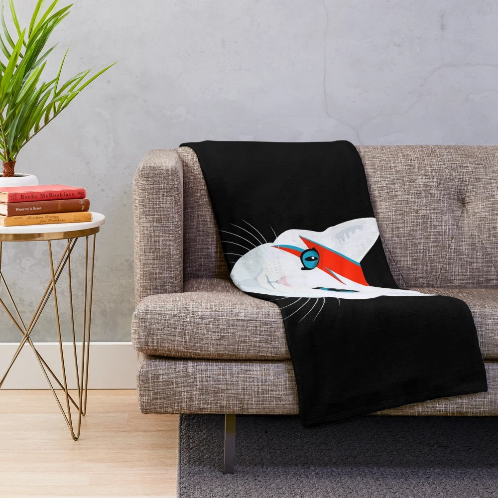White cat plush blanket with David Bowie's Ziggy Stardust-inspired design