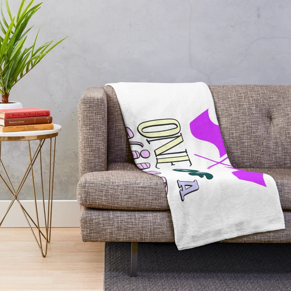 Colorful plush blanket featuring a color guard flag design for marching band enthusiasts
