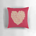 A heart-shaped pillow with a cat print, perfect for cat lovers and pet owners.