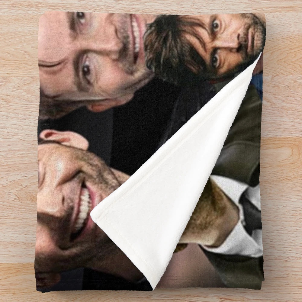 A cozy plush blanket featuring a custom photo collage of David Tennant as the Tenth Doctor from the TV series Doctor Who.