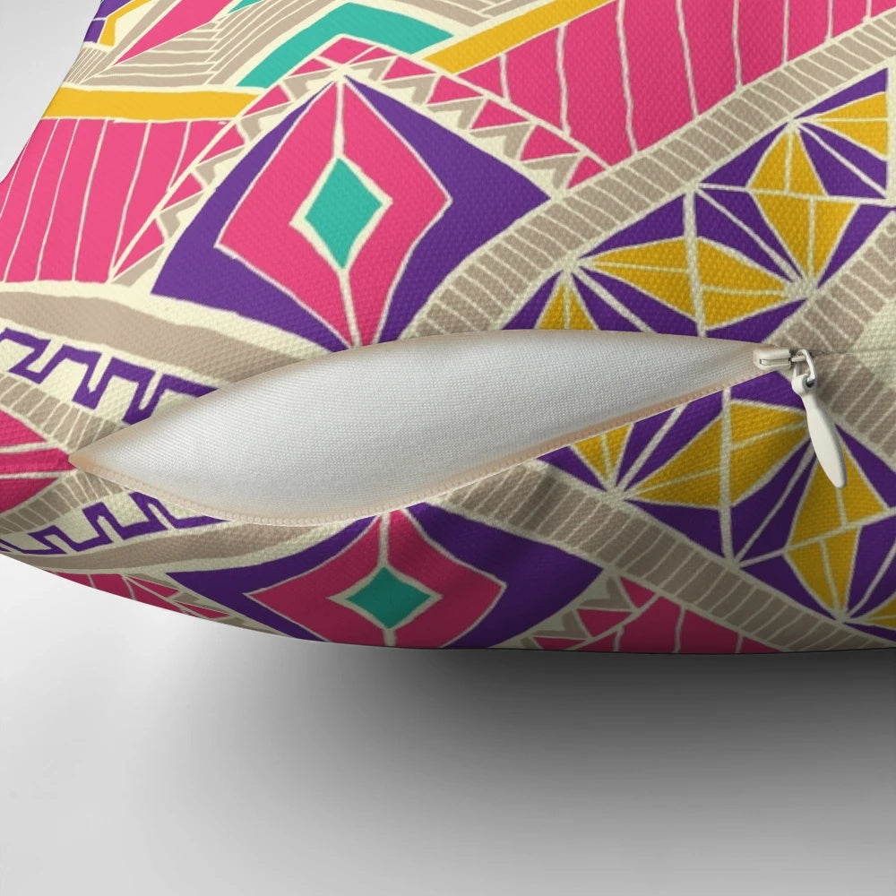 Decorative diamond-patterned accent pillow in pink and fuchsia colors