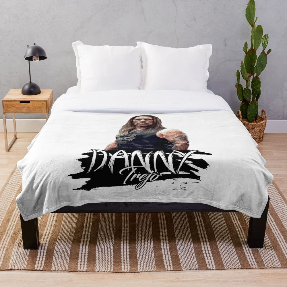 Digital illustration of Danny Trejo on a plush blanket