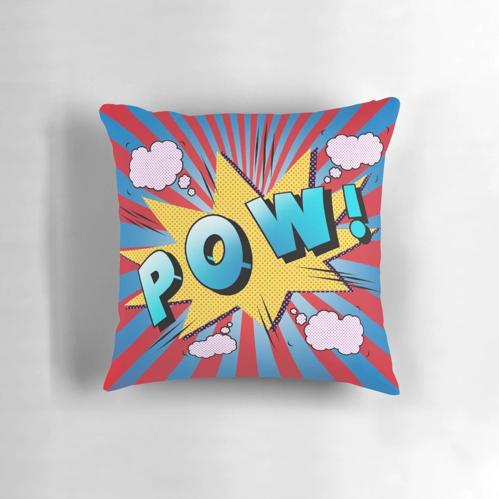 Vibrant pop art-inspired pillow with bold "POW" graphic and playful typography