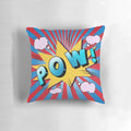 Vibrant pop art-inspired pillow with bold "POW" graphic and playful typography