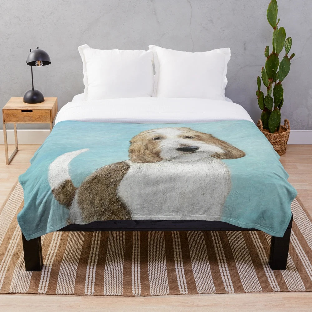 Grand Basset Griffon Vendeen dog portrait on a plush blanket