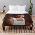 Cozy plush blanket featuring a portrait of famous actor Jackie Chan