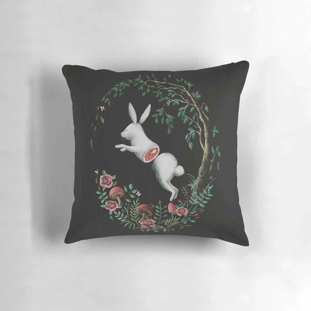 Vibrant and whimsical jump apart pillow featuring a pop surrealist design with rabbits, flowers, and other nature-inspired elements.