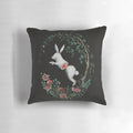 Vibrant and whimsical jump apart pillow featuring a pop surrealist design with rabbits, flowers, and other nature-inspired elements.