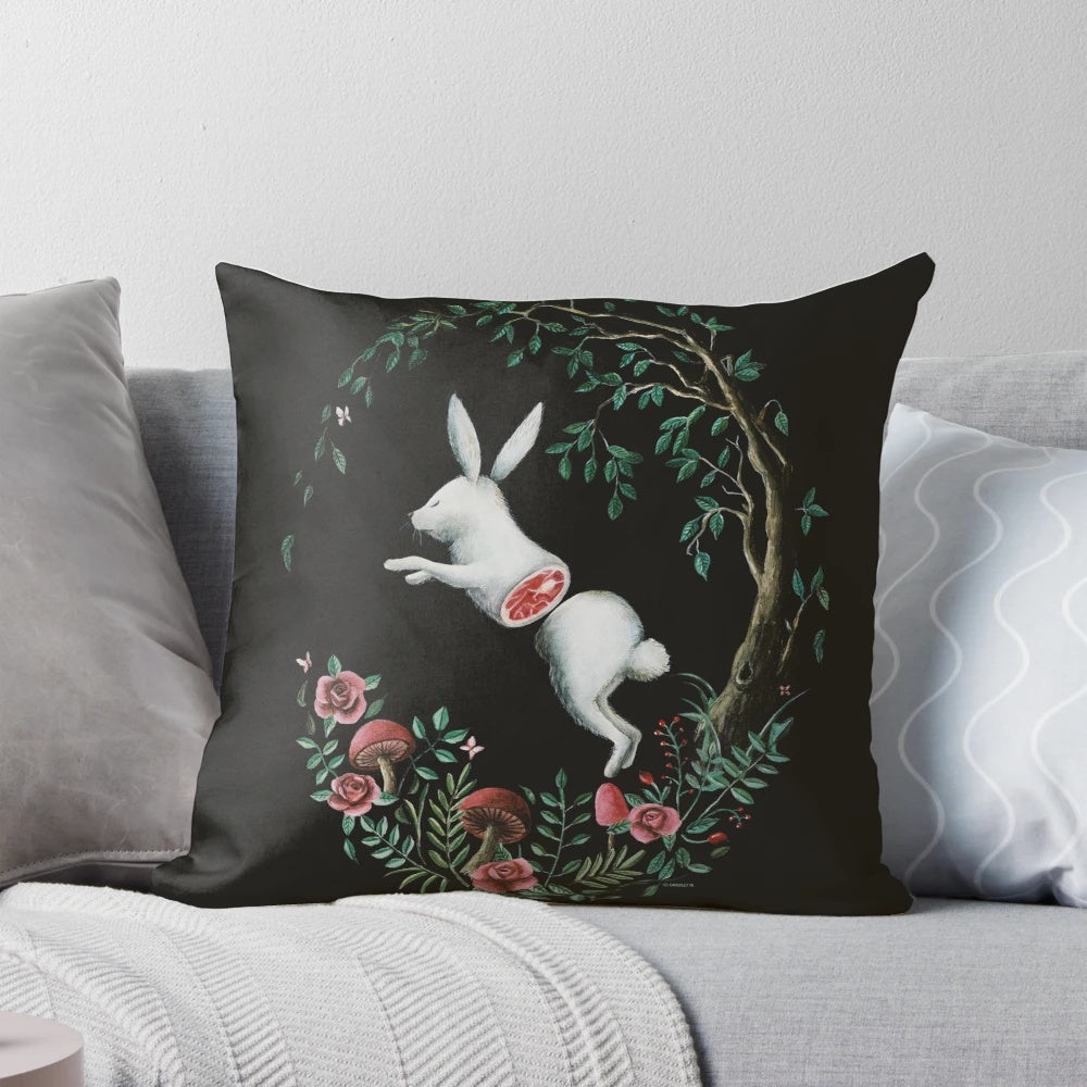Vibrant and whimsical jump apart pillow featuring a pop surrealist design with rabbits, flowers, and other nature-inspired elements.