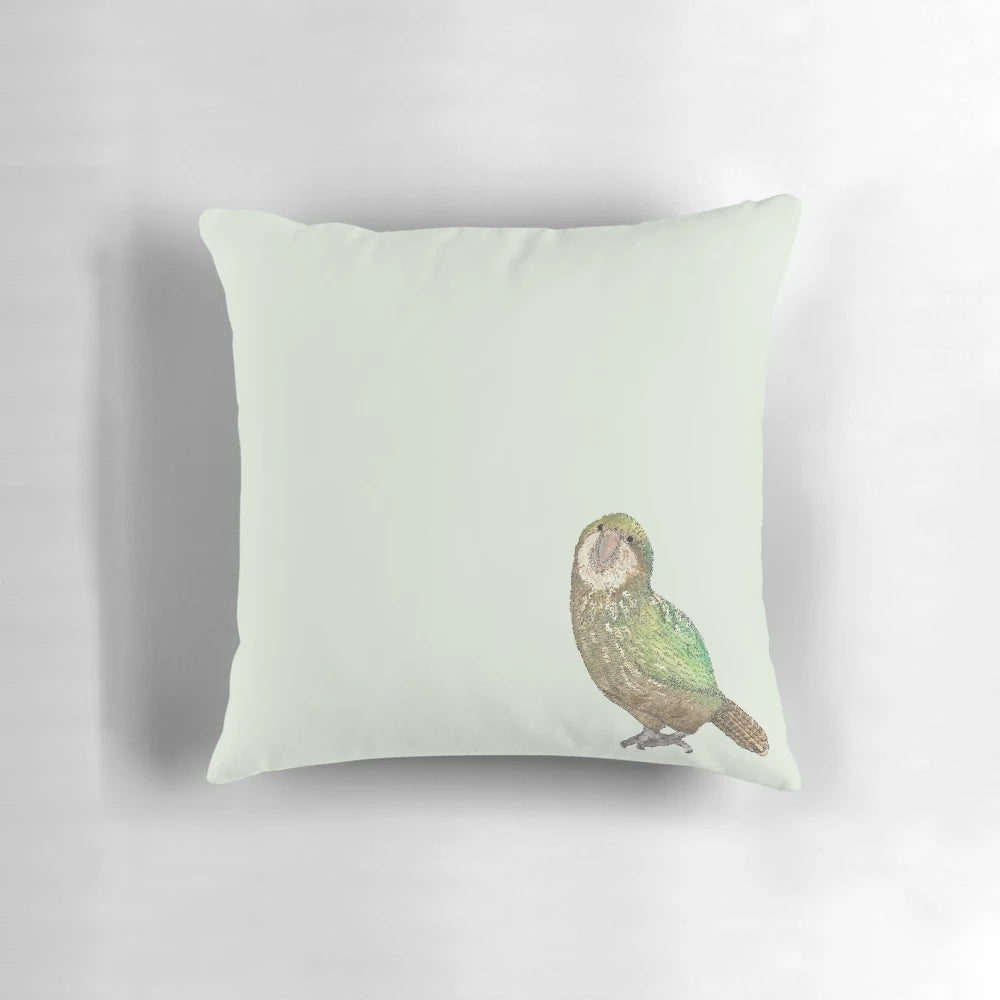 Soft, plush pillow in the shape of a kakapo, a critically endangered flightless parrot native to New Zealand.