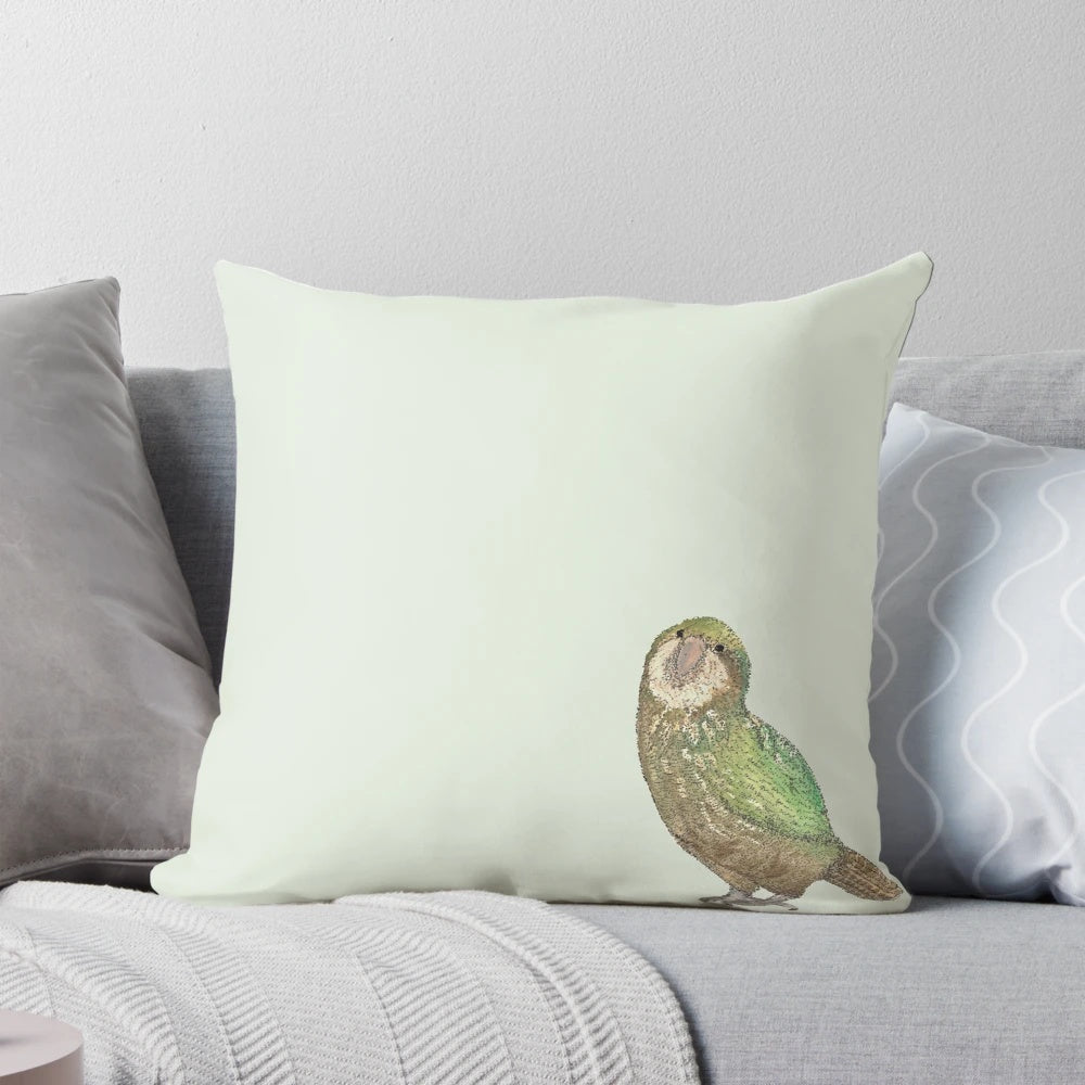 Soft, plush pillow in the shape of a kakapo, a critically endangered flightless parrot native to New Zealand.