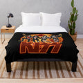 KISS band members plush blanket featuring Demon, Spaceman, Starchild, and Catman