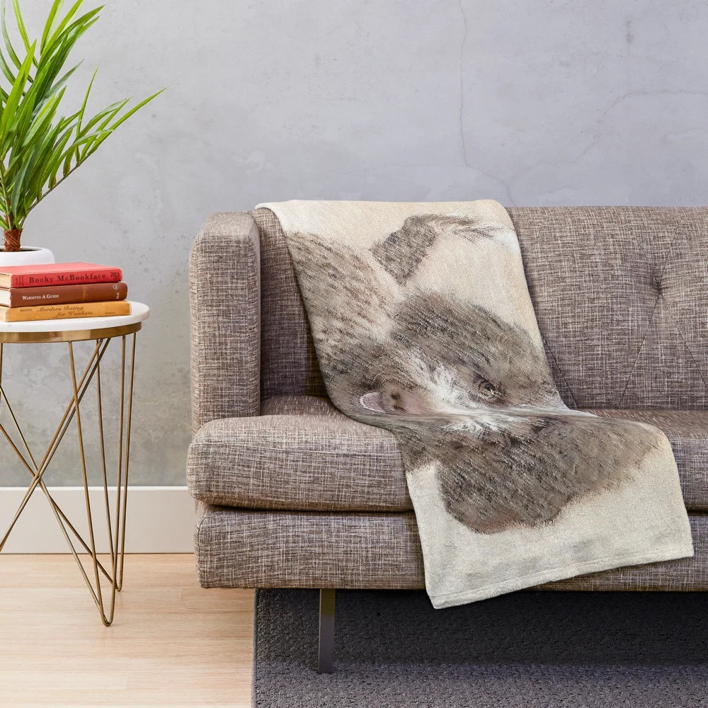 Lagotto Romagnolo dog portrait on a soft, cozy plush blanket