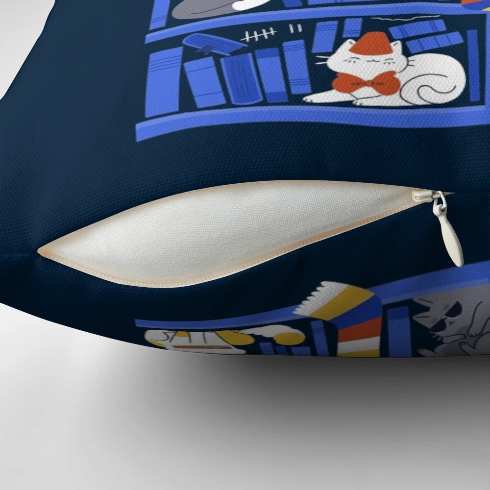 A cozy, customized pillow featuring a playful cat in a library-inspired design