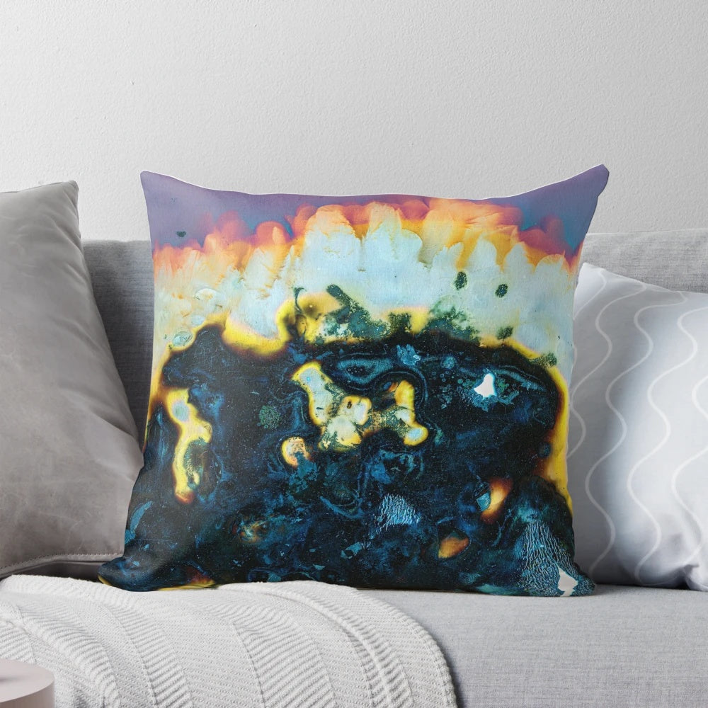 Lumen print art pillow featuring vibrant, plant-based imagery
