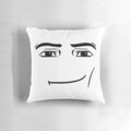 A plush, decorative pillow featuring a man's face design, great for adding a touch of humor and personality to any room.