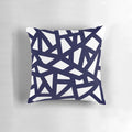 A navy blue decorative pillow with a geometric abstract pattern of intersecting lines and tiles
