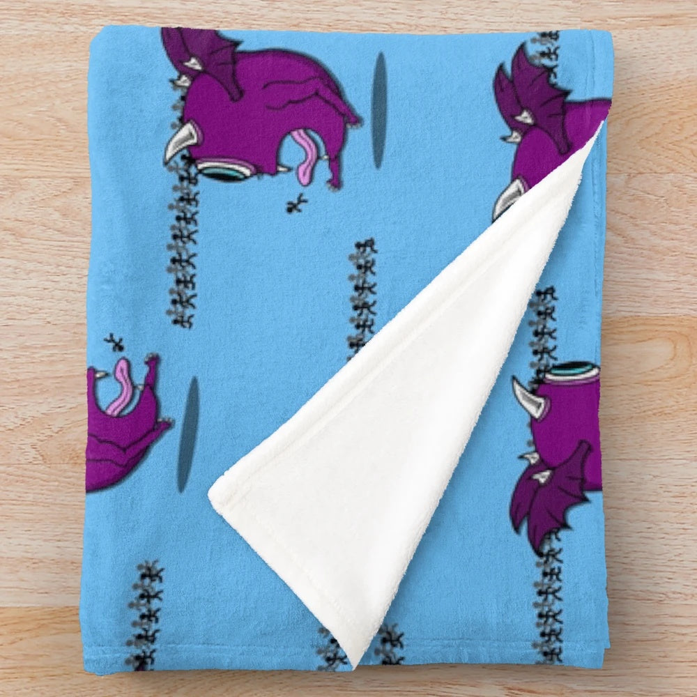Colorful plush blanket featuring the iconic one-eyed one-horned flying purple people eater monster