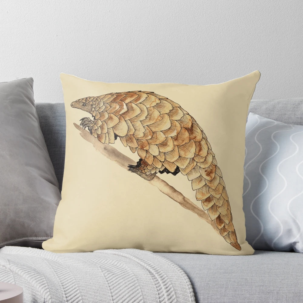 Decorative pangolin-themed throw pillow featuring the unique scaled mammal