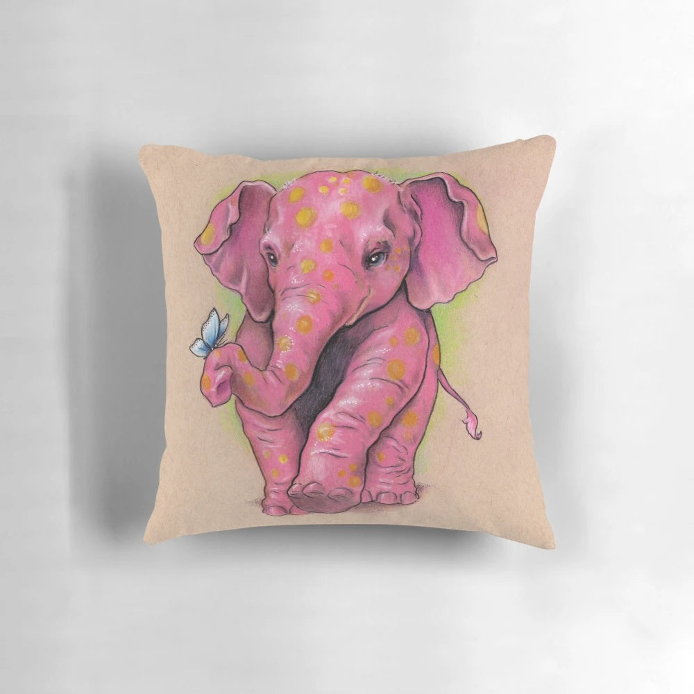 Vibrant pink elephant pillow with golden spots, hand-drawn original design by artist Justteejay