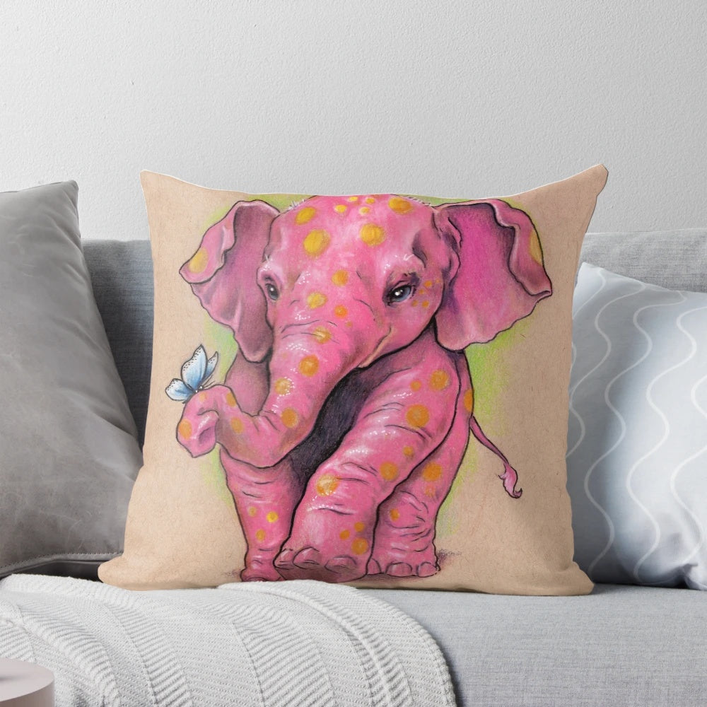 Vibrant pink elephant pillow with golden spots, hand-drawn original design by artist Justteejay