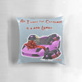A pink, sports car-shaped pillow with a Christmas theme, featuring the text "A pink lambo for Christmas