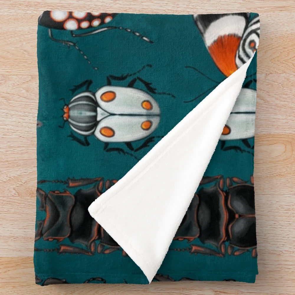 Plush blanket with detailed insect designs for nature and science lovers