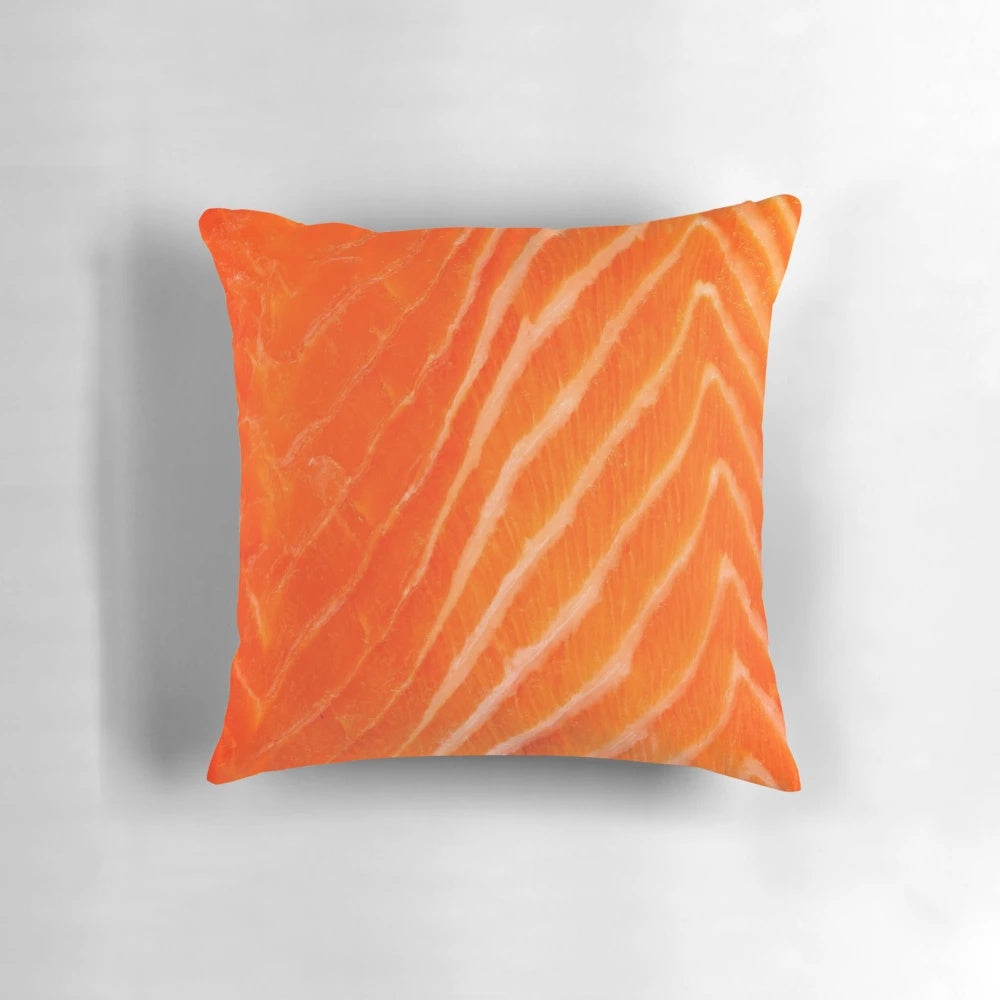 Close-up image of a raw salmon on a soft, plush pillow