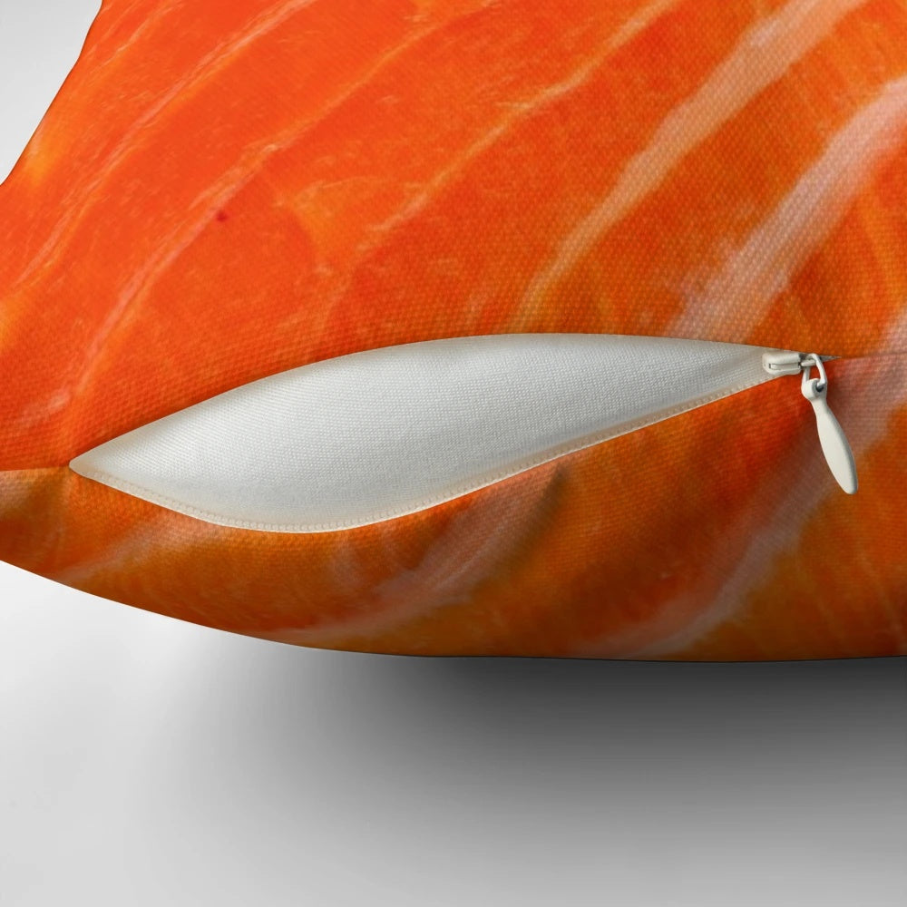 Close-up image of a raw salmon on a soft, plush pillow
