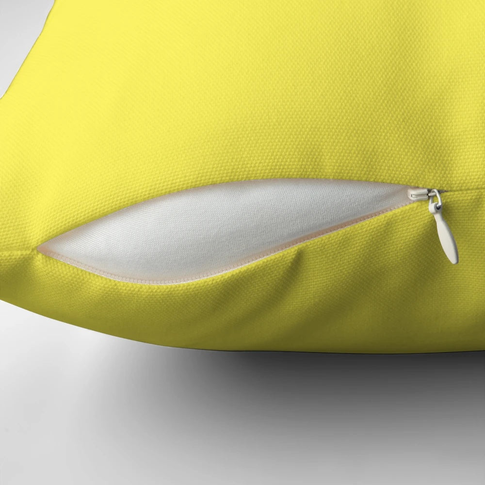 Spongebob-themed pillow with a smirk face design