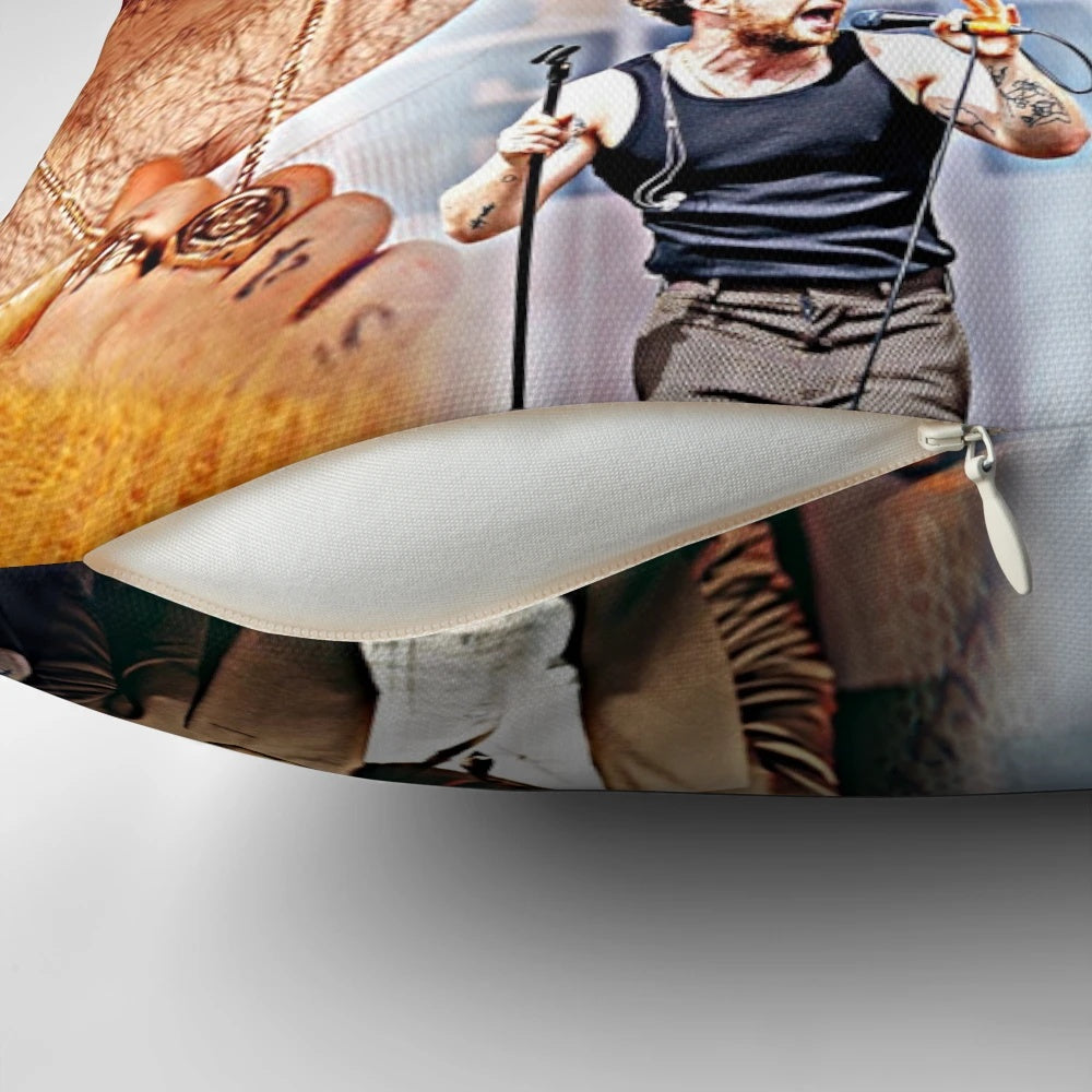 A decorative pillow featuring an artistic collage design of British singer-songwriter Tom Grennan.
