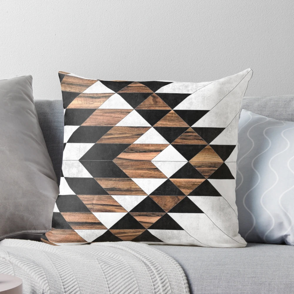 Decorative tribal patterned pillow with concrete and wood elements