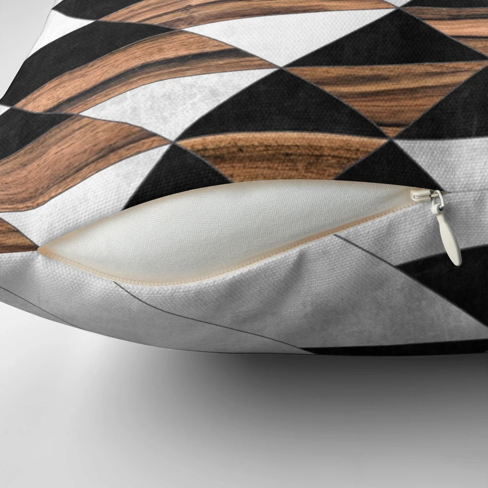 Decorative tribal patterned pillow with concrete and wood elements