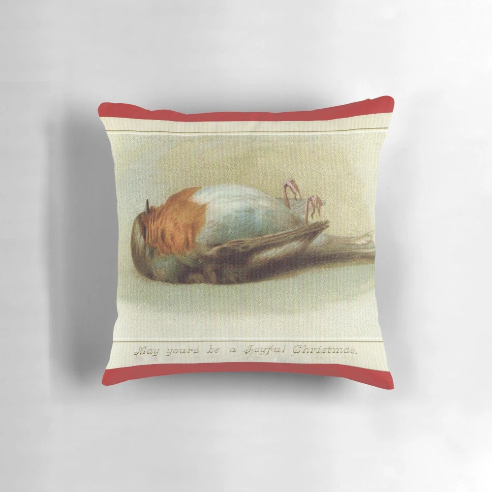 Unusual vintage-style pillow featuring a dead bird, perfect for adding a quirky touch to your holiday decor.